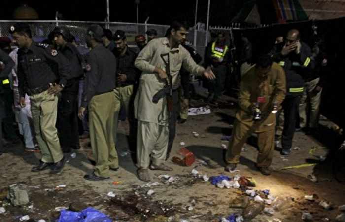 Bomb near mosque in northwest Pakistan kills at least 22, wounds dozens