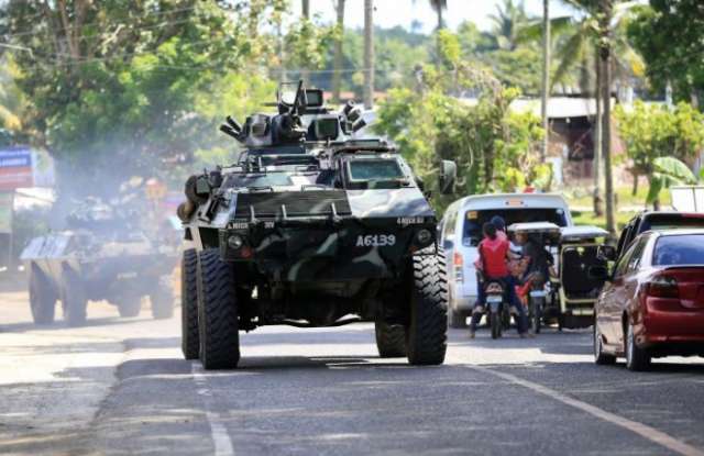 Philippines deploys helicopters in battle to retake city from Islamist rebels