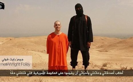 İŞİD jurnalistin başını kəsdi - VİDEO