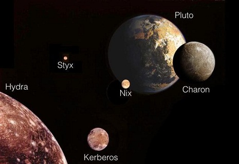 NASA finds Pluto`s moons tumbling in absolute chaos