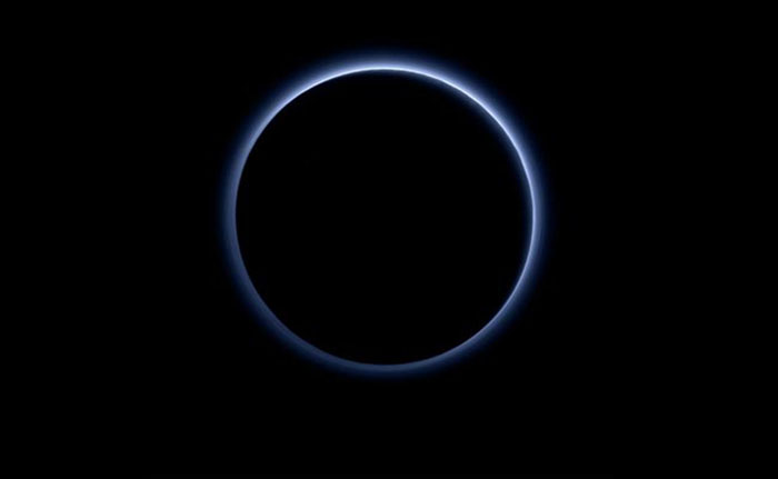 Blue skies, frozen water detected on Pluto