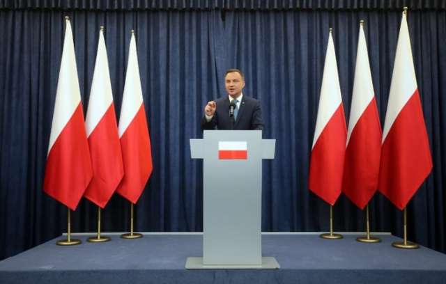 Poland’s President vetoes 2 proposed laws limiting courts’ independence