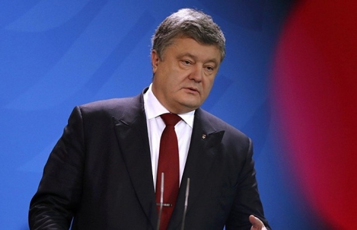 Acusan a Poroshenko de intentar huir a España 