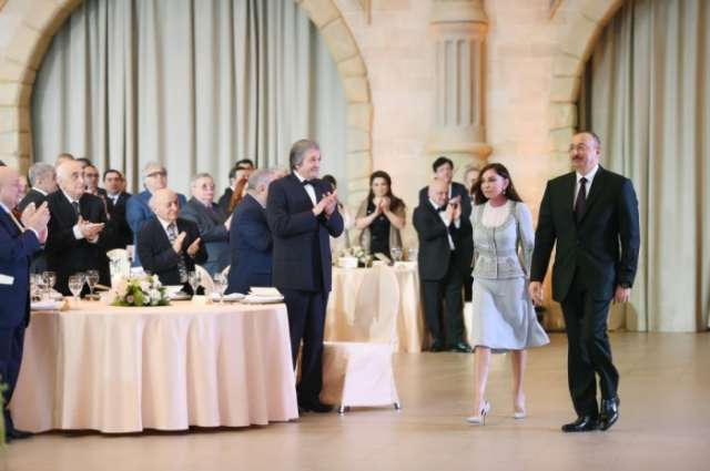 Azerbaijani president holding official receipt on 28 May,
 Republic Day - PHOTOS