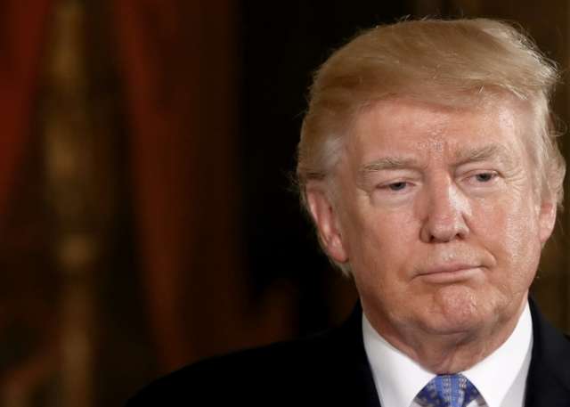 Trump declines to say Russia is a security threat