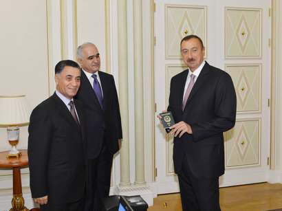 President Ilham Aliyev handed over first biometric passport of Azerbaijani citizen