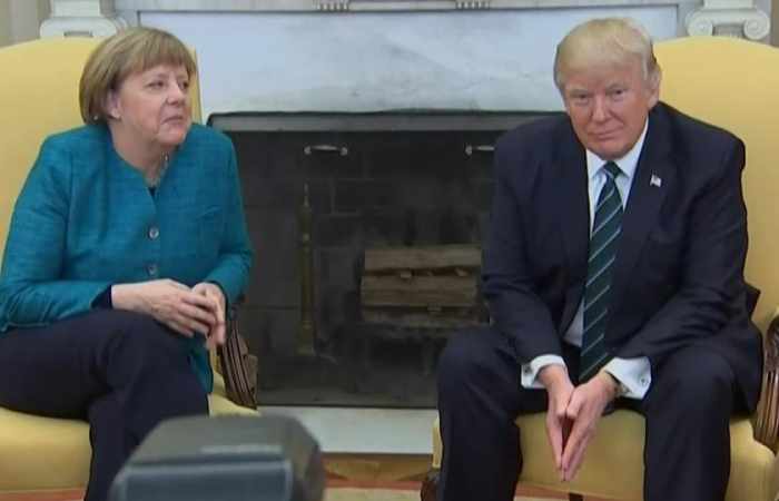 Donald Trump ignores handshake request from Angela Merkel - VIDEO
