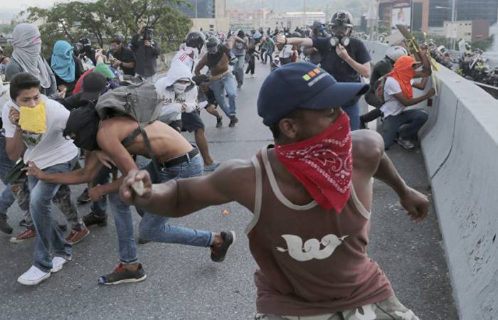 Some 40 people injured in protests in Caracas prompted by Maduro's initiative