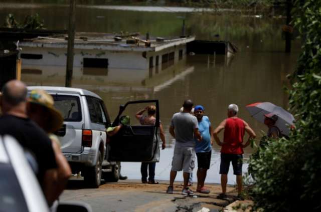 Puerto Rico evacuates area near crumbling dam, asks for aid