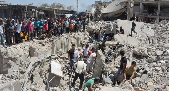 El número de muertos en el atentado en la ciudad siria de Qamishli asciende a 52 