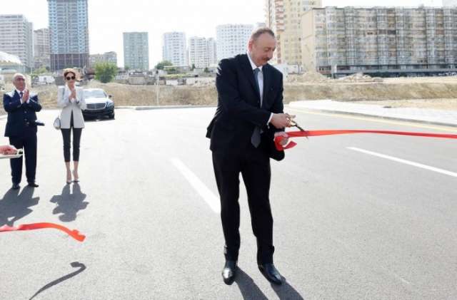 Azerbaijani president, first lady attend opening of newly-built roads in Baku