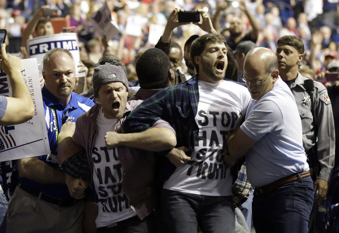 Protesters block road outside Trump Arizona event, march in NYC