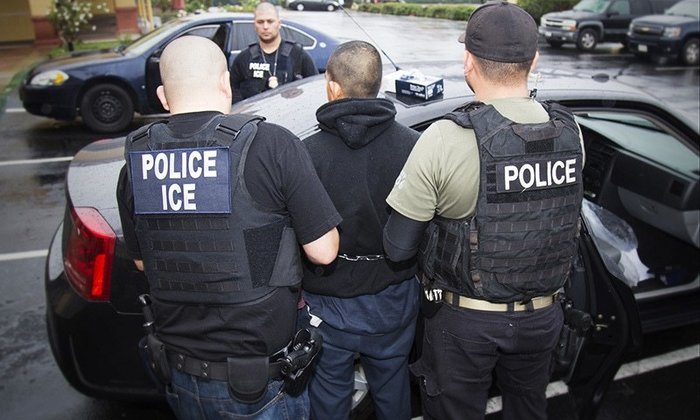 Hundreds of immigrants arrested in `routine` U.S. enforcement surge