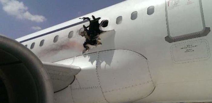 Man `sucked out of plane` after explosion