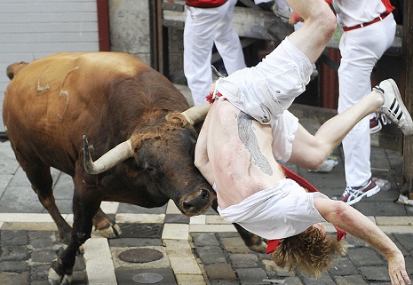 2 Americans Gored in Spain`s Running of the Bulls, 9 Others Injured