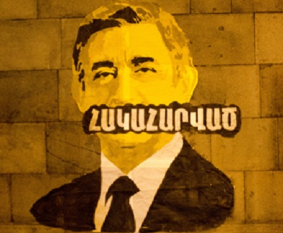 Street Art humiltaing Armenian president appears on Parliament Building