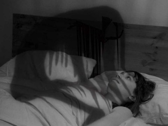 What is sleep paralysis?