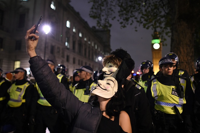 Tens of thousands in Guy Fawkes masks expected at anti-capitalist protest - VIDEO