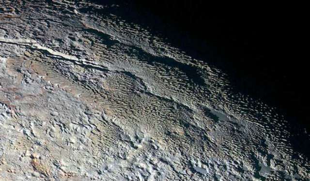 `Snakeskin` Photos Reveal Pluto in Dazzling Details