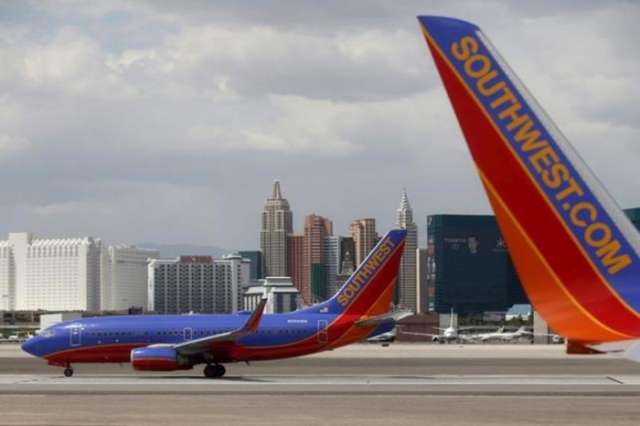 Hundreds of Southwest flights delayed by online booking problems