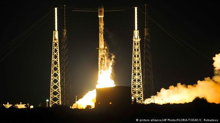 SpaceX rocket lands at sea after satellite launch