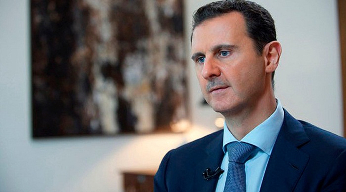 Syria`s Assad says savage Paris attacks similar to what his country is facing 