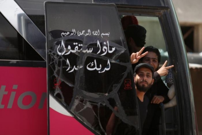 Syrian rebels begin to leave last opposition-held Homs district