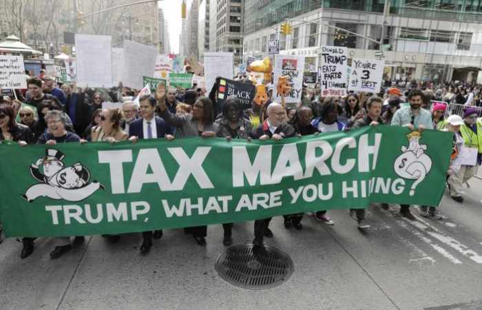 Thousands at New York rally demand Trump release tax returns
