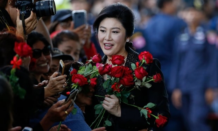 Ex-Thai PM who failed to appear in court 'may have fled country'