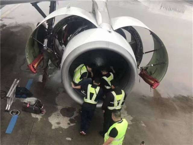 Elderly woman throws coins in plane's engine to 'pray for safe flight' out of Shanghai airport