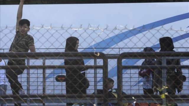 Greek police evacuate crowded Athens migrant camp