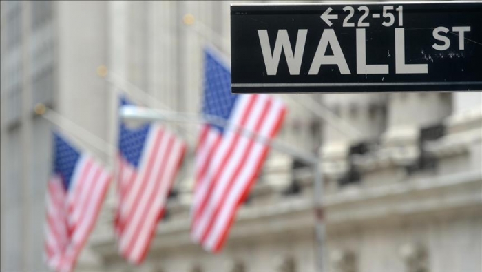 Wall Street closes lower but indexes end month higher