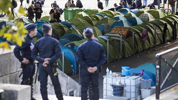French authorities clear Paris refugee camps