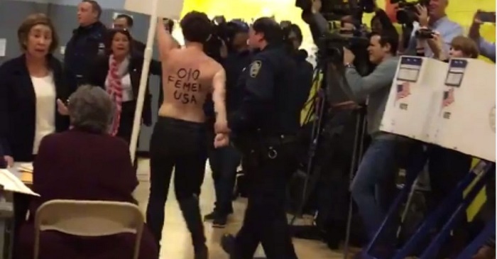 Topless protesters crash Trump`s polling place - VIDEO