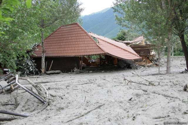 8 dead, 1 missing in NE China downpours