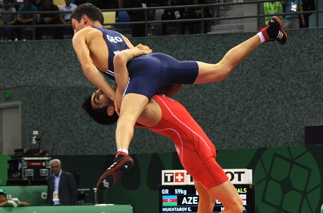 Two Azerbaijani wrestlers reach finals at Baku 2015