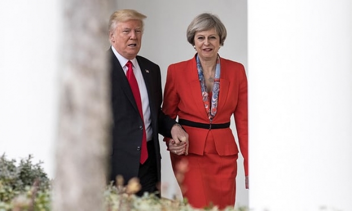 Donald Trump attacks British PM Theresa May over her criticism of his far-right retweets