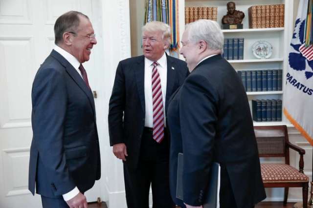 With awkward timing, Trump meets top Russian Official