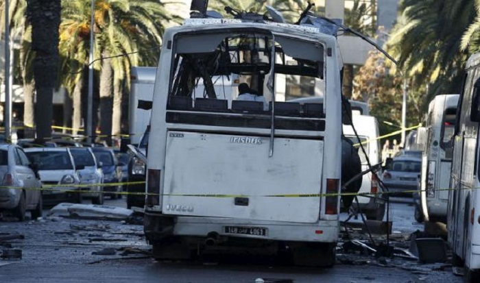 Tunisia says identifies bus attack suicide bomber, makes 30 arrests