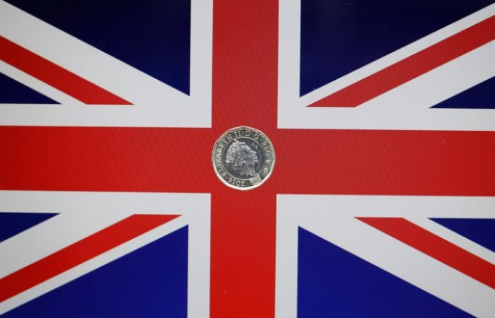 Faulty new UK one-pound coins fetching a mint on eBay