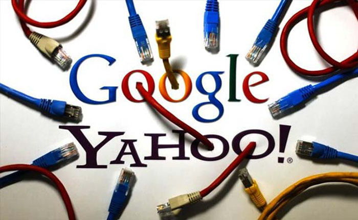 Yahoo signs ad pact with google; earnings and revenue miss