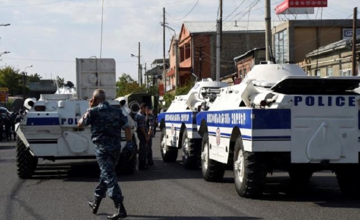 Armed men seizing Yerevan’s police building refuse to surrender 