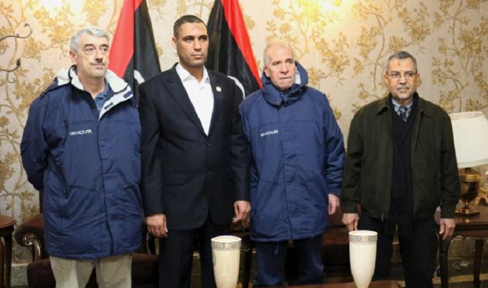 Freed Italian hostages flown home from Libya